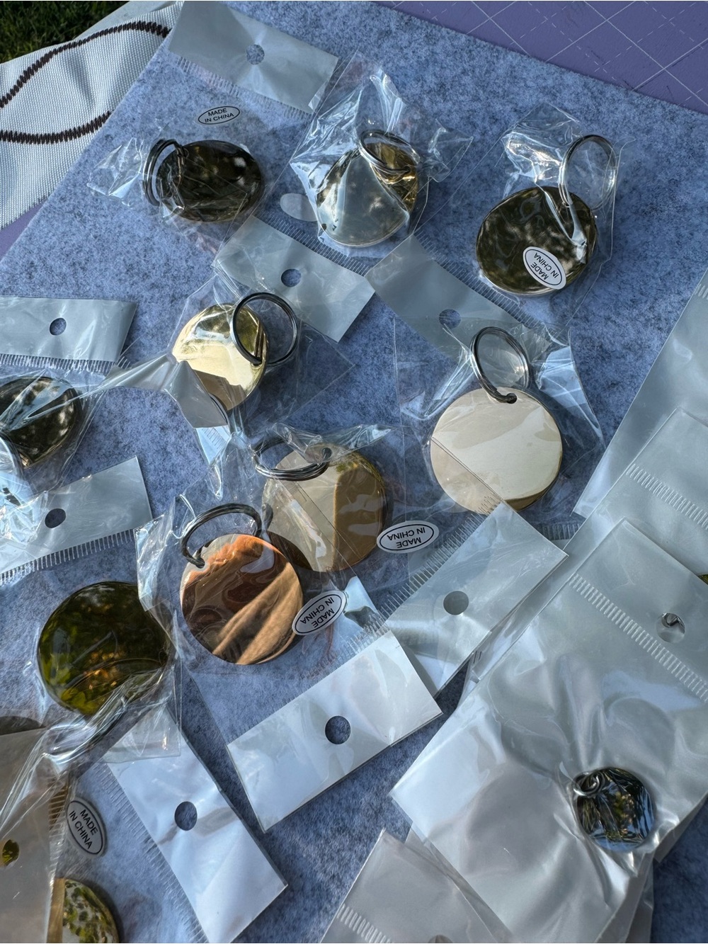 Lot of Shiny, Engravable Plunder Disc Charms
